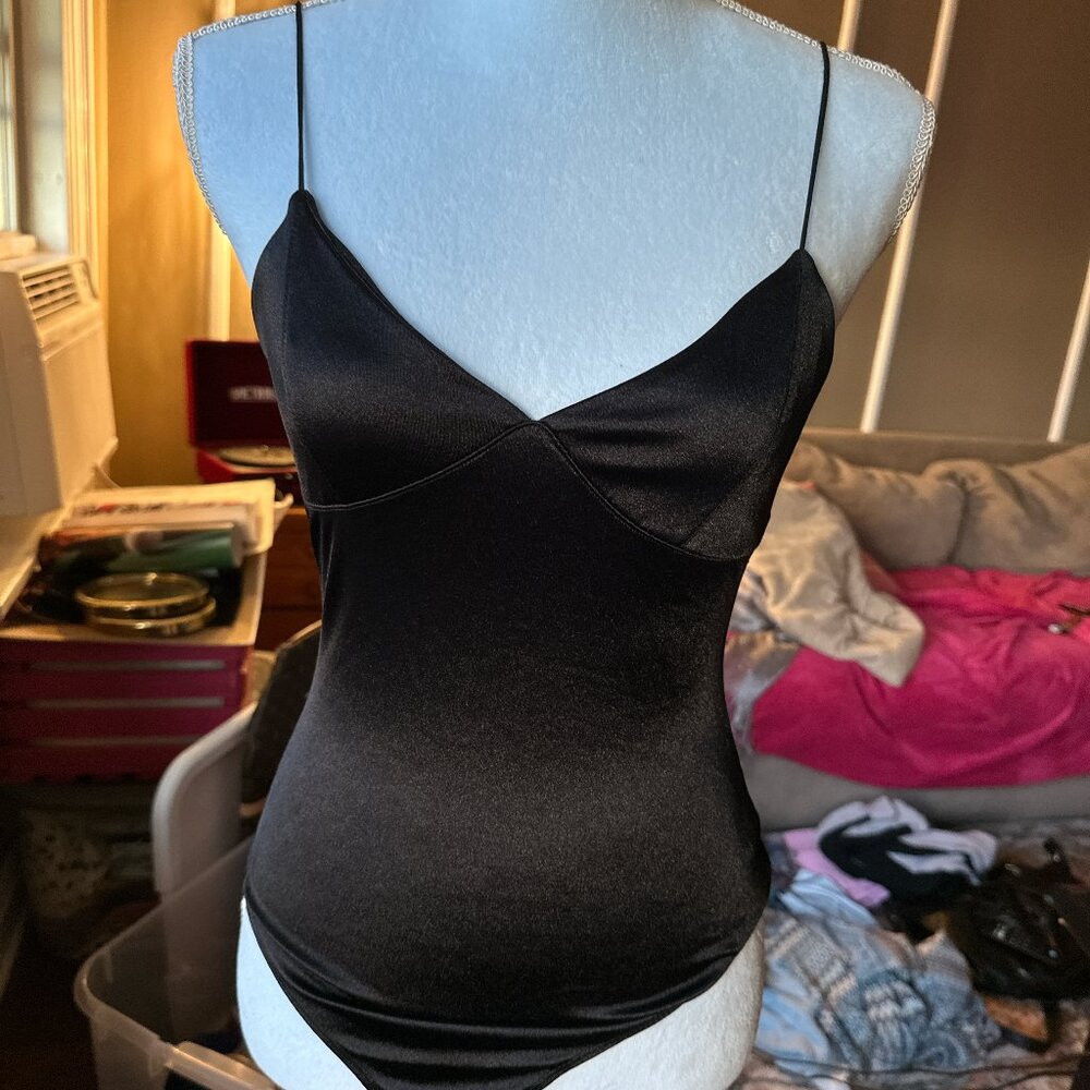 Shiny black GARAGE bodysuit